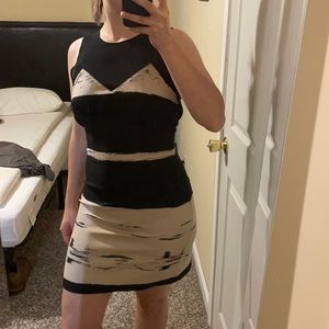 Black and tan evening mini dress with sheer neck